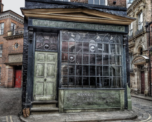 Building dressed as an old Victorian pawn shop on a film set.